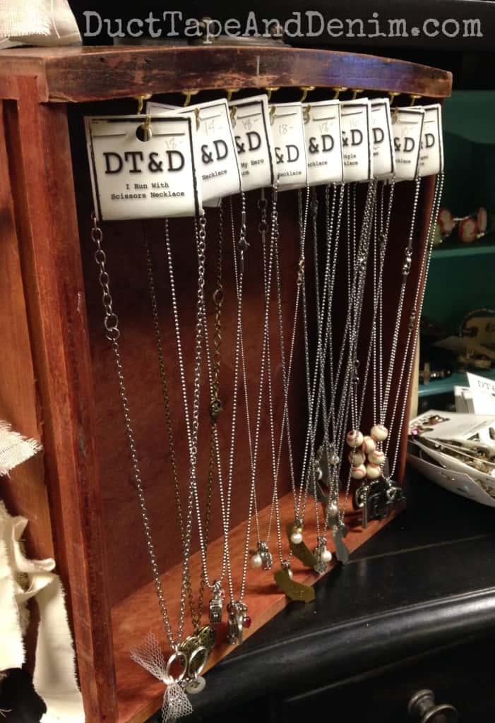 Old drawer I use to display short necklaces on my shelf at Paris Flea Market and other vintage markets | DuctTapeAndDenim.com
