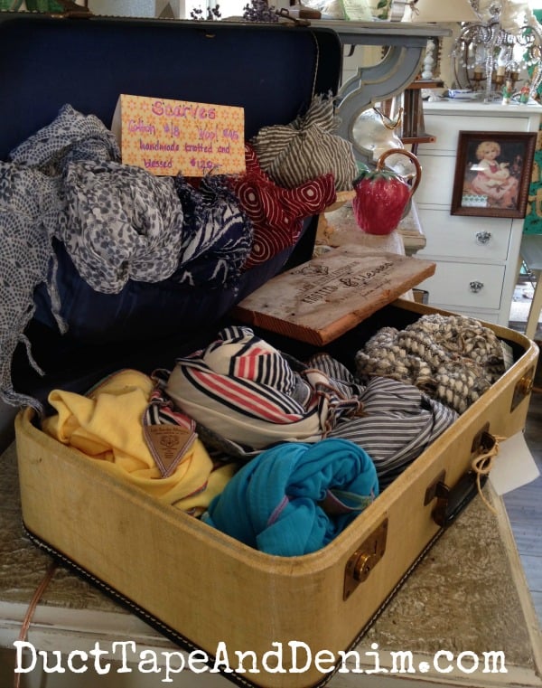 Scarves displayed in a vintage suitcase at Suburban Peacock in Alamo, California | DuctTapeAndDenim.com