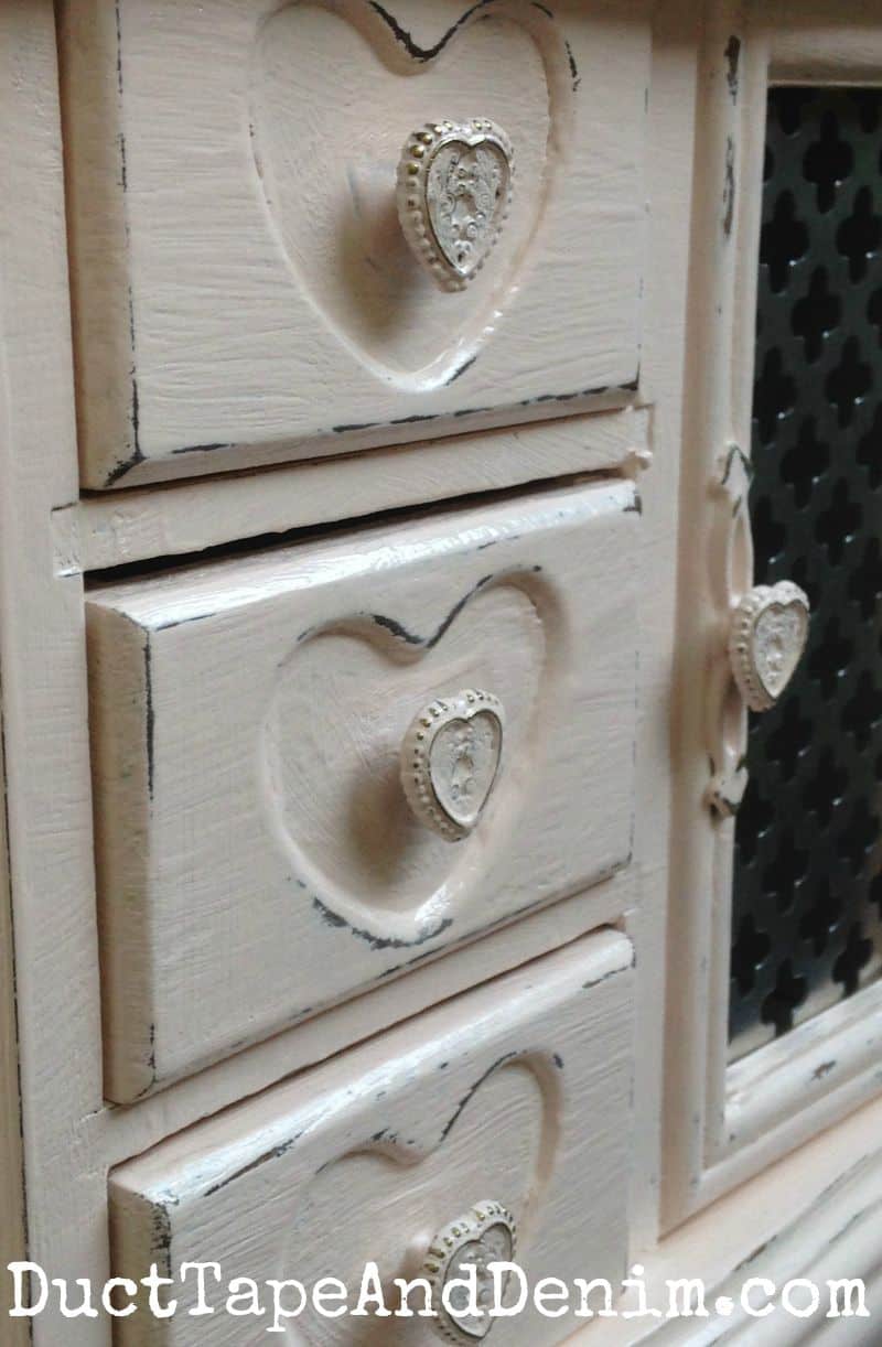 Love the heart shapes on the drawers of this old jewelry cabinet | DuctTapeAndDenim.com