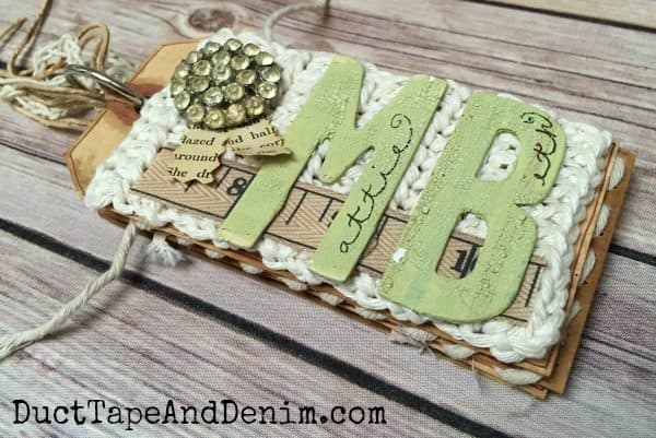 Shipping tag memory album for my grandmother with vintage fabric and rhinestone button