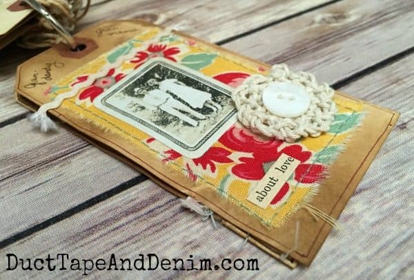 Shipping tag memory album for my grandmother with vintage fabric and rhinestone button