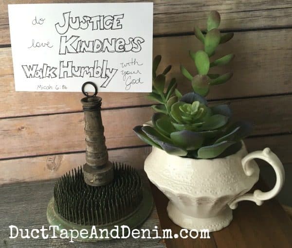 Do justice, love kindness, walk humbly with your God. Micah 6:8. Bible verse card on vintage hose nozzle photo holder. | DuctTapeAndDenim.com