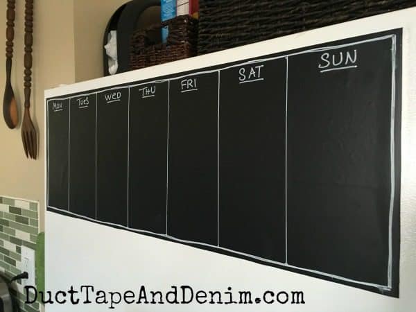 My finished chalkboard meal planner on the refrigerator | DuctTapeAndDenim.com