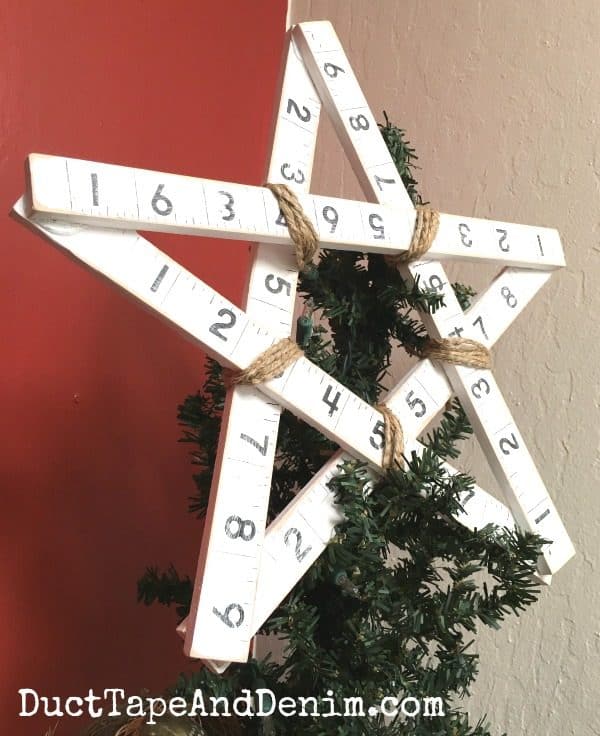 Finished DIY Christmas star with jute string on tree | DuctTapeAndDenim.com