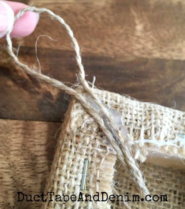 How to put a hanger on the back of doily burlap Christmas ornaments. DIY tutorial on DuctTapeAndDenim.com