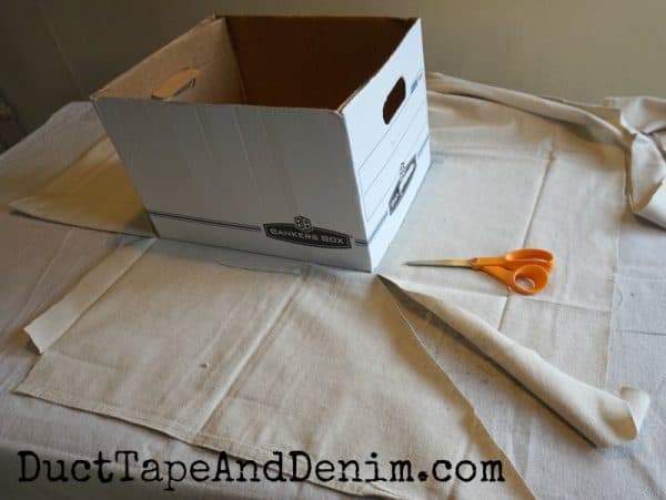 Cutting corners, covering file box with drop cloth | DuctTapeAndDenim.com
