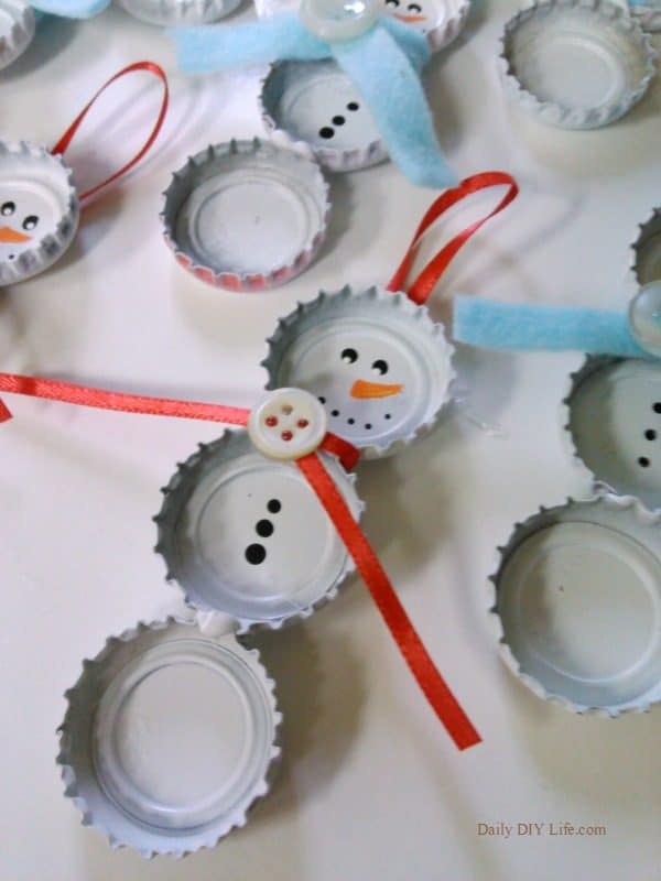 Snowman Christmas ornament made with bottle caps
