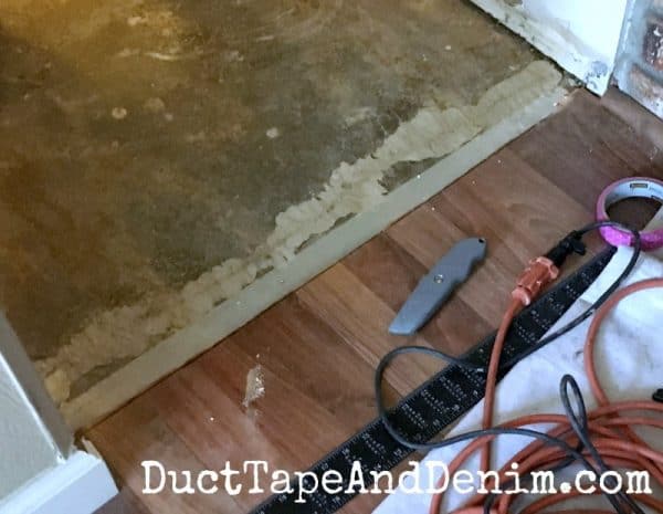 After cutting the laminate flooring | DuctTapeAndDenim.com