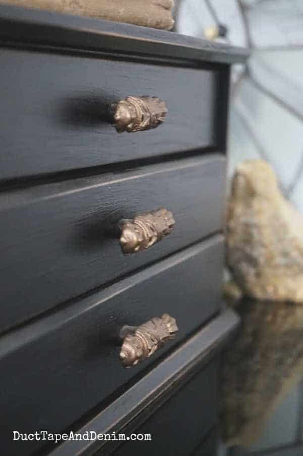 close up of black jewelry box drawers