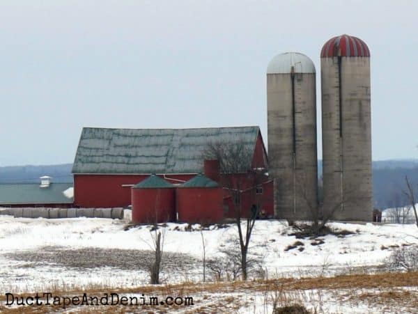 Red barn with silos in Ontario, Canada | DuctTapeAndDenim.com