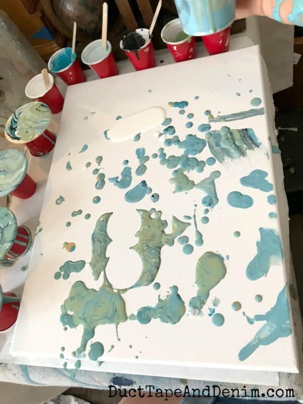 Leftover paint from paint pouring becomes new artwork