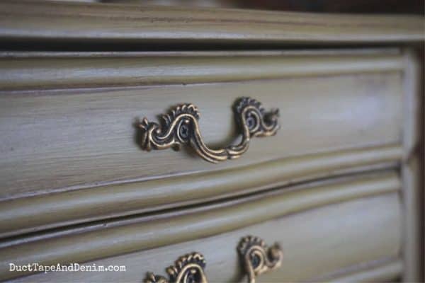 close up of handles on green jewelry box