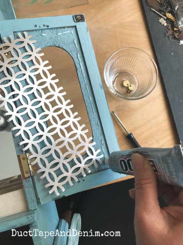 replacing glass with decorative metal