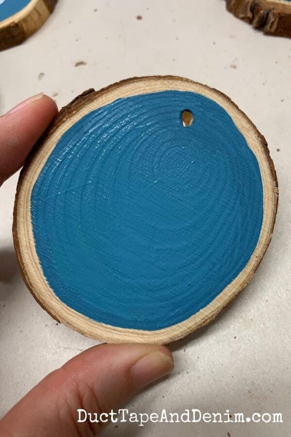 wood slice ornament with painted center